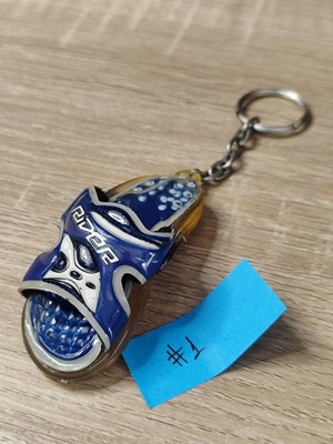Vintage Rider Keychain used with yellowing from years