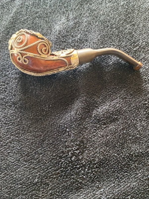 Vintage tobacco pipe used with metal details