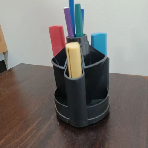 Rotating plastic pencil holder like new with contents
