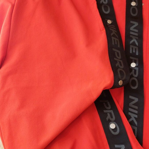 Nike pants red like new, size small