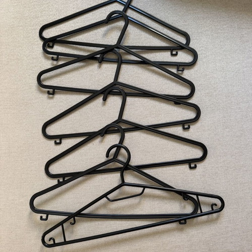 Set of 7 black hangers like new