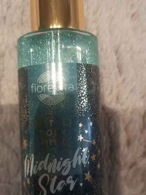 Body spray with glitter like new