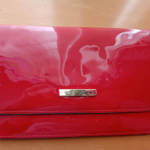 Wallet like new with mark, red patent leather