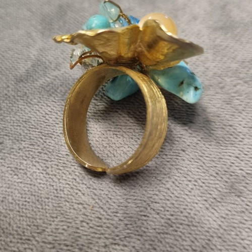 Handmade ring new with adjustable size, blue and gold colors