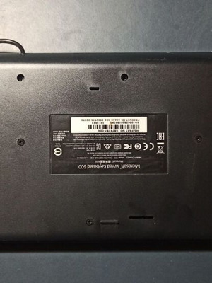 Microsoft computer keyboard used with one missing rear support