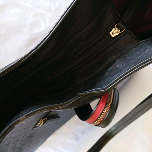 Women's shoulder bag used, black with red details