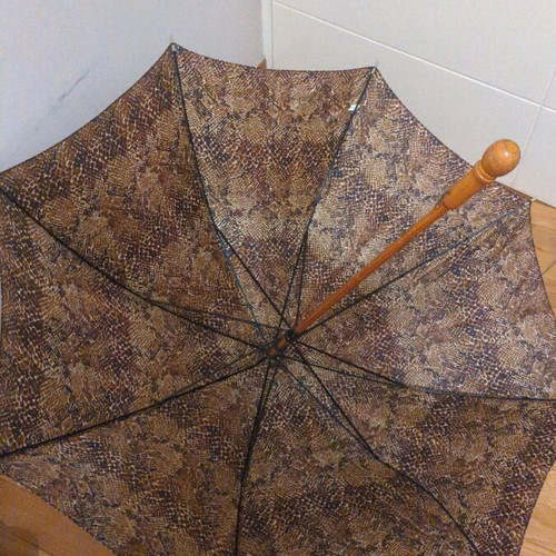 Wooden umbrella used, diameter 92 inches, length 77 inches