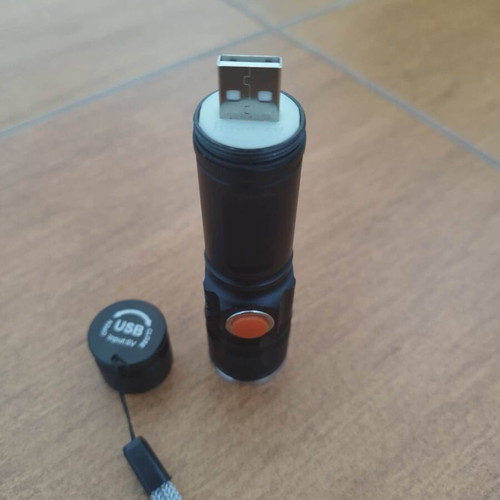 Flashlight with USB port used