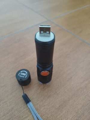 Flashlight with USB port used