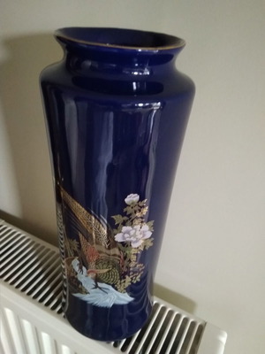 Vintage porcelain vase used with painted birds