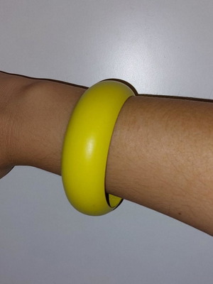 Yellow wooden bracelet used
