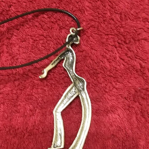 Happy Dancer necklace used with silver dancer pendant on black cord