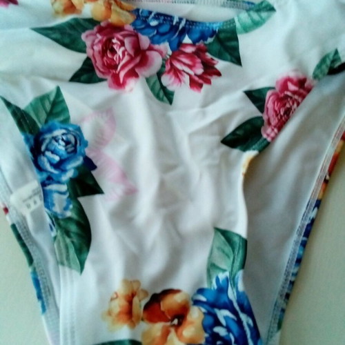 Women's swimsuit new, size small, yellow and floral
