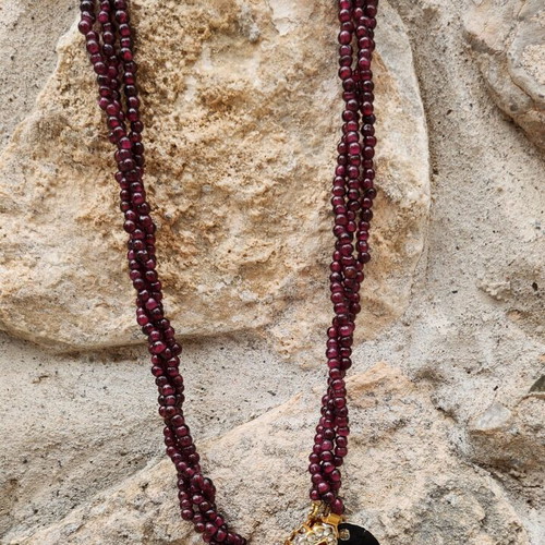 Vintage multilayer necklace with genuine garnet and gold-plated clasp