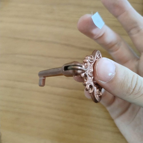 Vintage brass key refurbished with rose gold paint