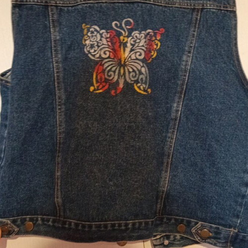 Women's denim vest with butterfly print, size M, like new