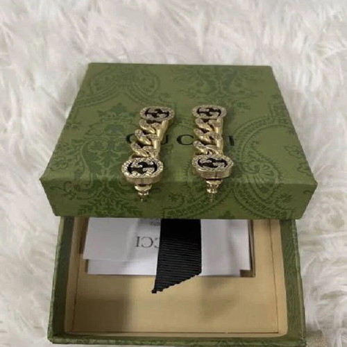 Gucci earrings like new, gold color