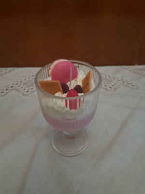 Candle with sweets new, aromatic soy in glass