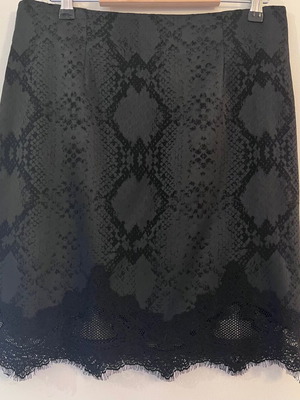 Lauren Vidal short skirt with snake skin pattern and lace trim