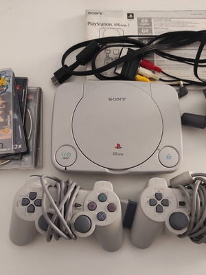Sony PlayStation PS one console with 2 controllers and 6 games