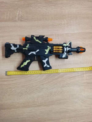 Toy gun with sound and lights like new
