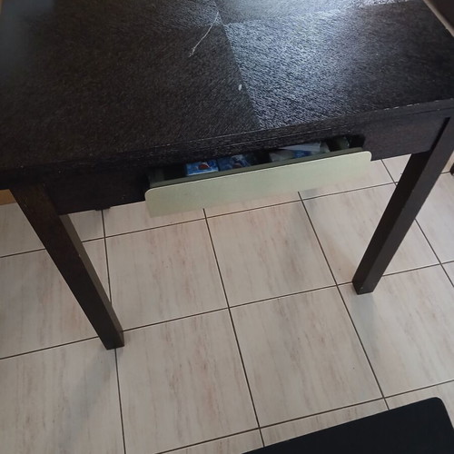 Extendable kitchen table used, black with silver drawer