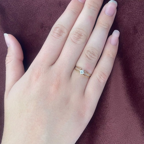 Gold ring with diamond. Solitaire.