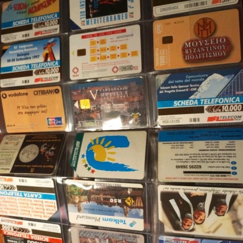 Phone card album like new, 75 cards from various countries and Greece