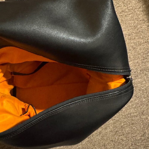 Leather backpack like new, black with orange lining