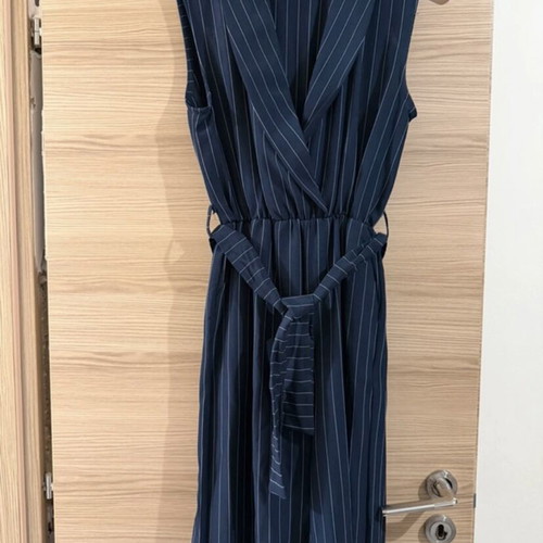 Office jumpsuit with deep blue stripes and belt