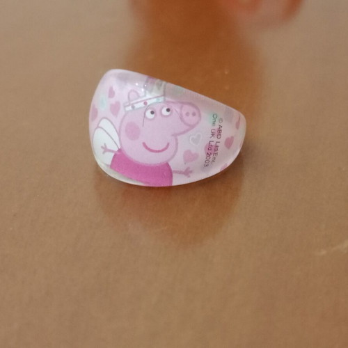 Peppa Pig figure with 3 children's rings like new