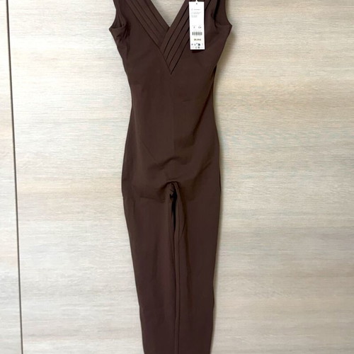 Oysho Comfortlux compression jumpsuit with V open back, size S