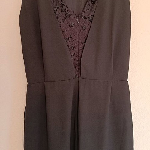 ST black one-piece jumpsuit like new official