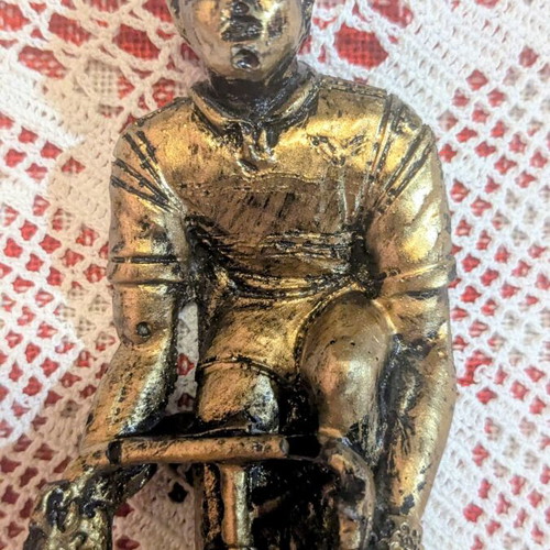 Vintage decorative cyclist figurine on marble base