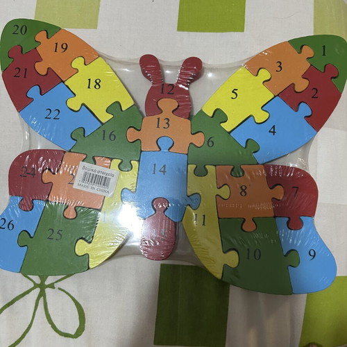 Wooden puzzle with numbers and English letters, new