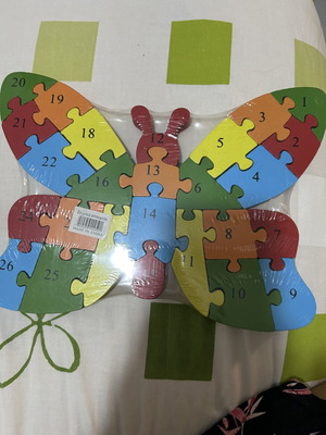 Wooden puzzle with numbers and English letters, new