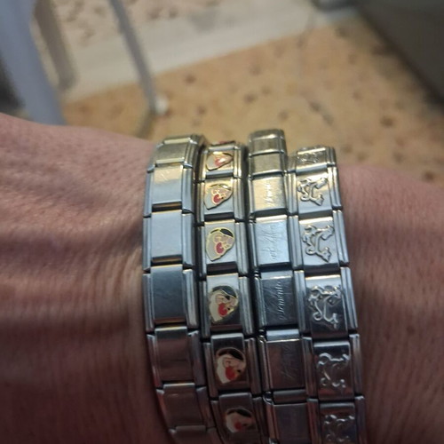 Bracelets set of 4, like new, silver color