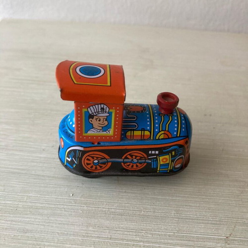 Small metal toy train made in China not working like new