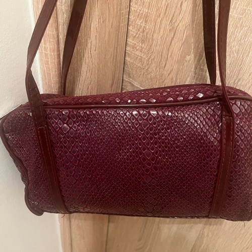 Fabric bag in burgundy color like new for formal occasions