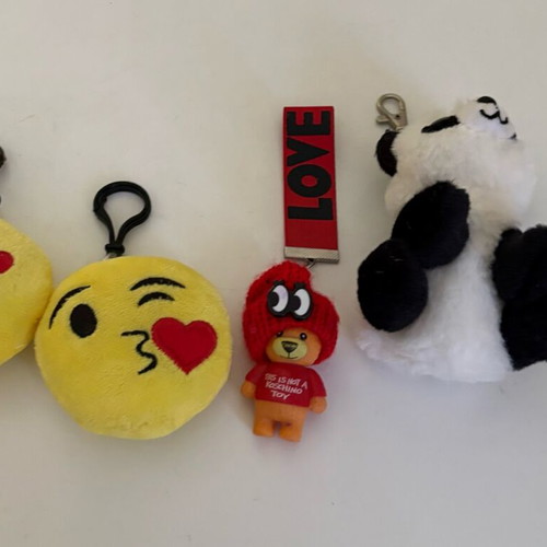 Set of 4 plush keychains with emoji, panda and love doll