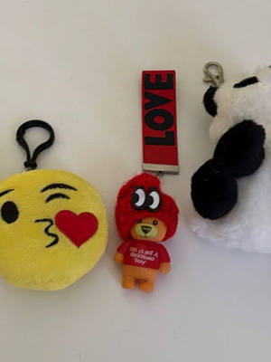 Set of 4 plush keychains with emoji, panda and love doll