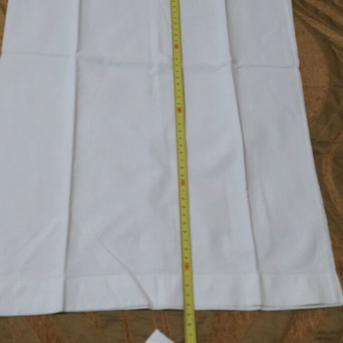Set of 2 white pillowcases used for sleeping
