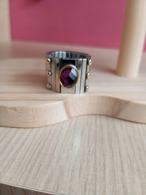 Faux ring silver with gold details and purple stone like new