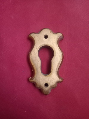 Brass keyhole escutcheon