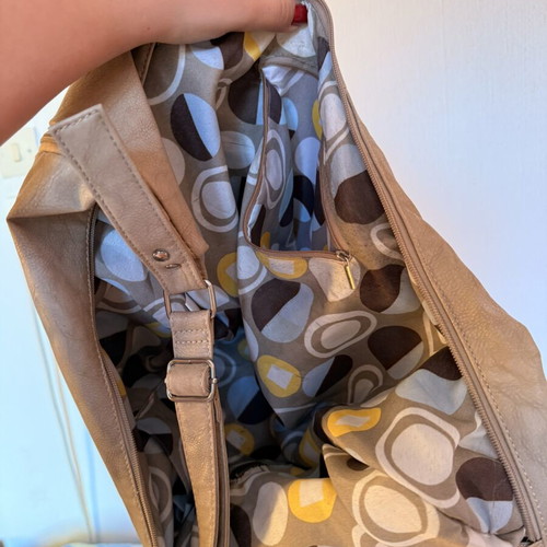 Crossbody bag beige like new with large storage space, banana style