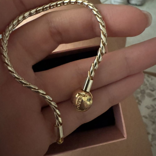 Pandora bracelet with 14K gold plating and round safety clasp like new