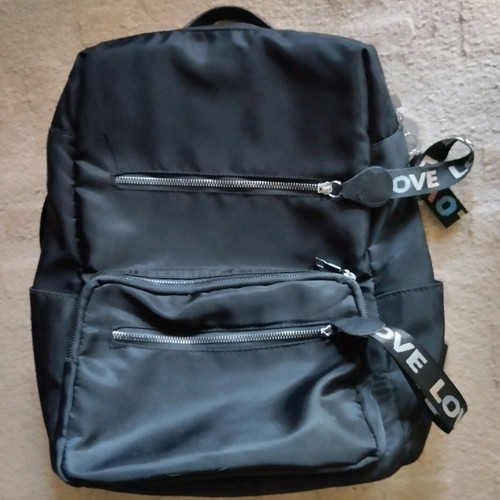 Black backpack like new with multiple compartments