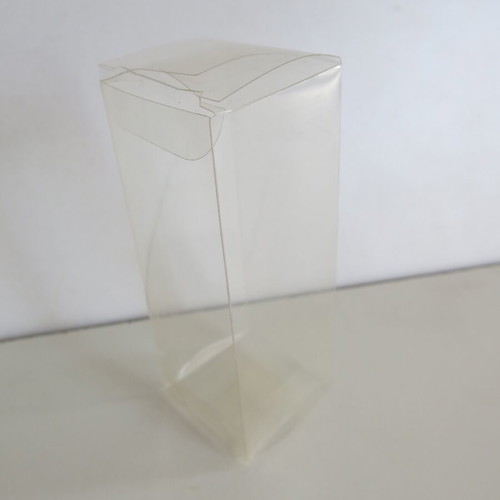 Plastic transparent cases used for figures and Game Boy