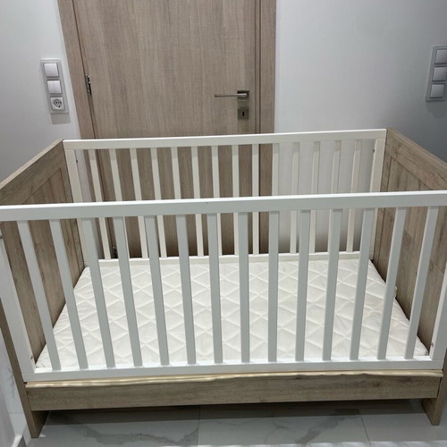 Baby cot used with mattress and linens
