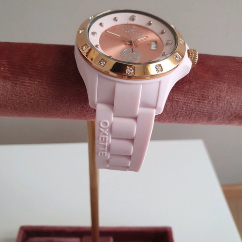 Oxette pink women's watch with rubber strap and pink gold dial like new